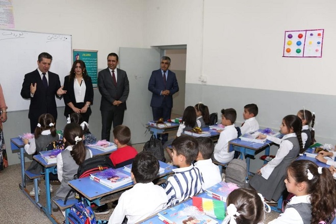 Prime Minister Masrour Barzani speaks to students in Duhok on the first day of school, Sept. 21, 2019. (Photo: KRG)